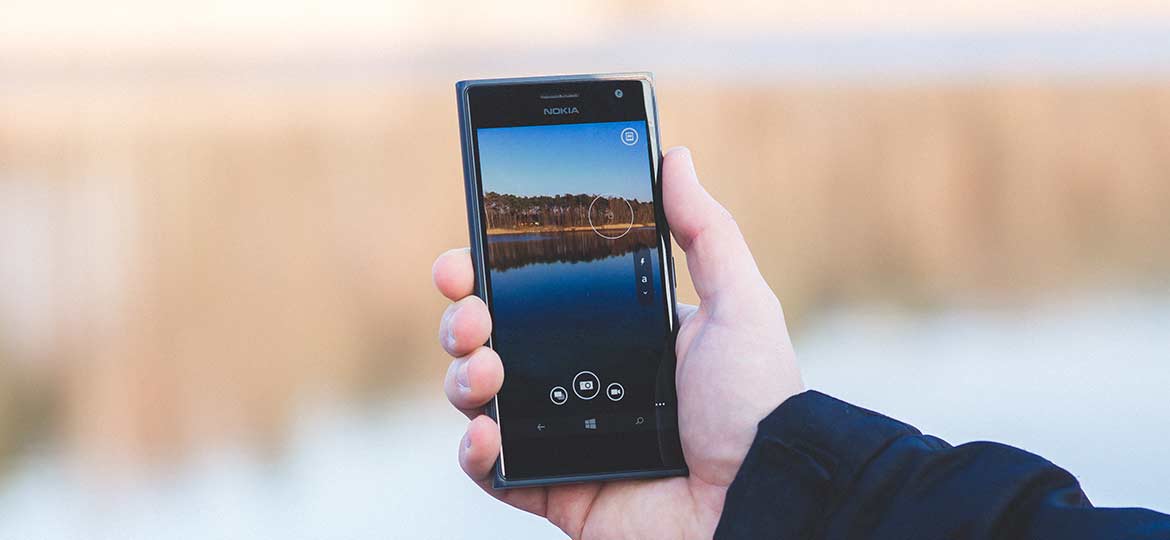 Person Holding Smartphone